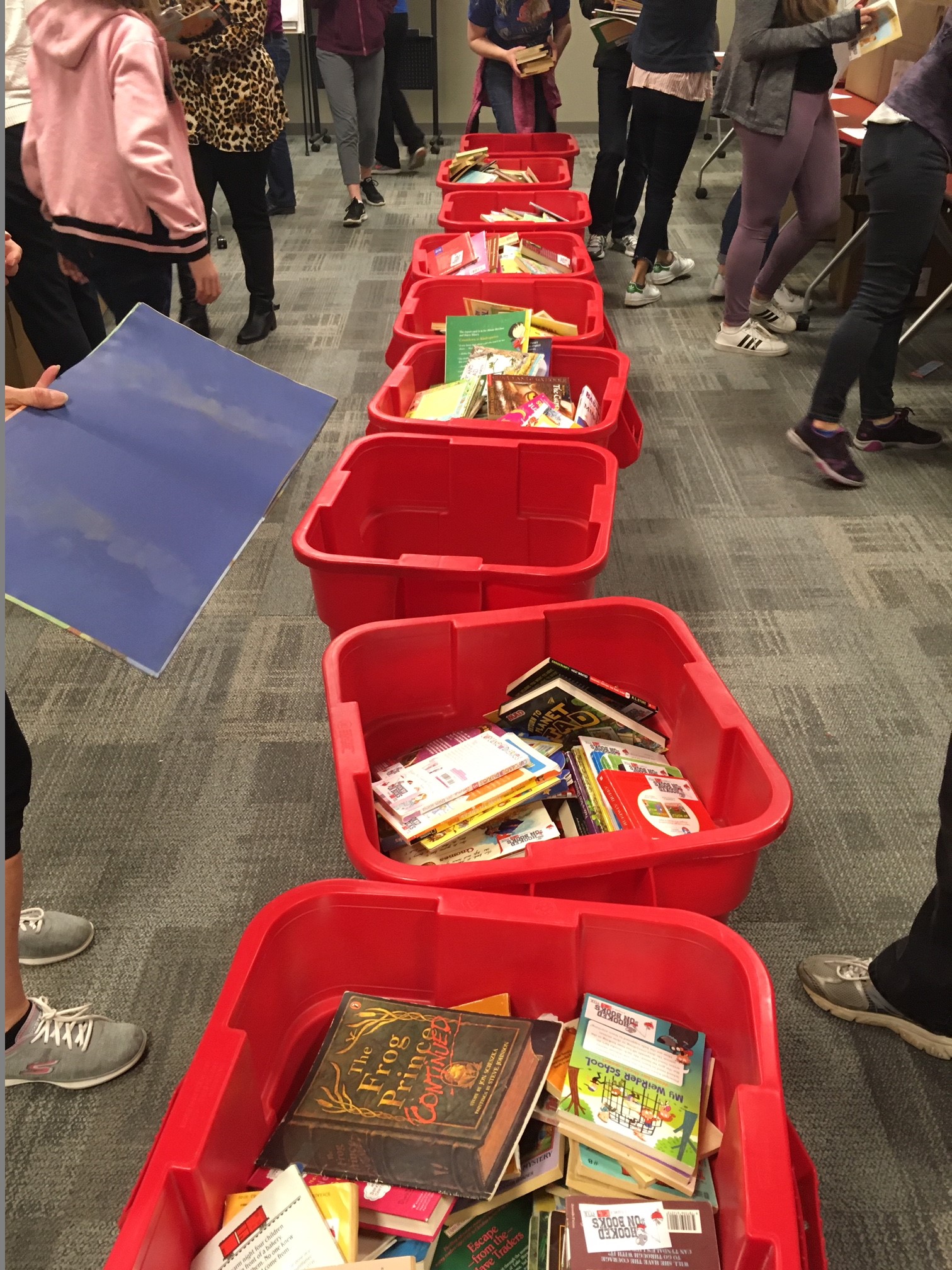 Hooked on Books by the Numbers: 13,000 Books, 16 schools, 50+ Volunteers!